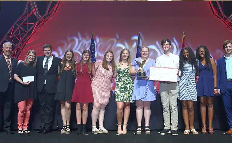 2018 High School Senior Science Olympiad Winners pose on stage