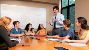 a group of students listening to their instructor