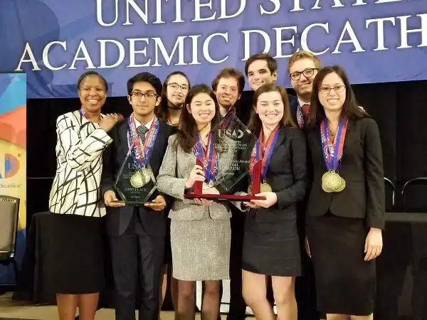 A group of students received an award for the academic decathlon.
