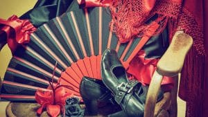 A fan and dancing shoes for Flamenco