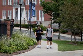 Tufts students walking in the campus