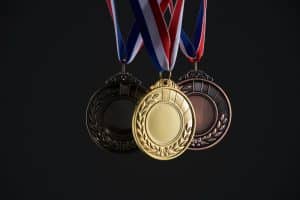 three medals dangling