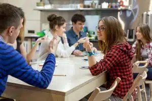 students discussing matters within school club