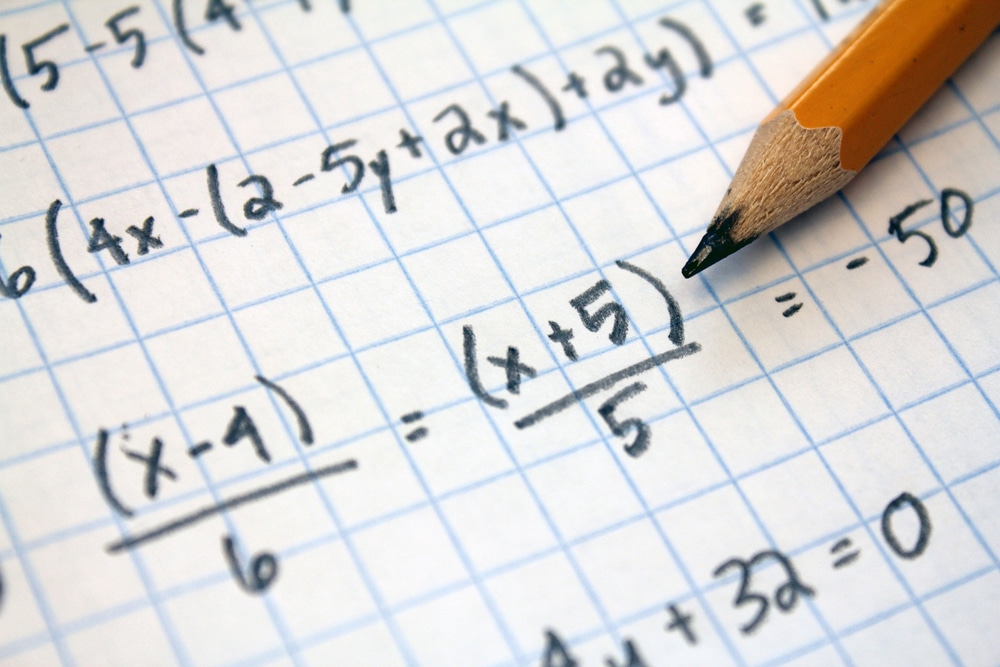 a math problem with a pencil