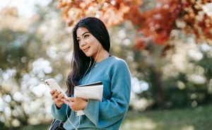 student in blue sweater thinking am i good enough for university of chicago