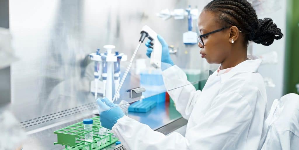 Female biology student working on a laboratory.