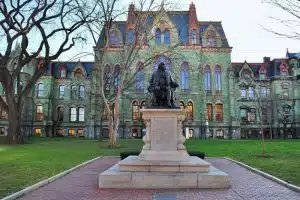 A statue in front of a building.