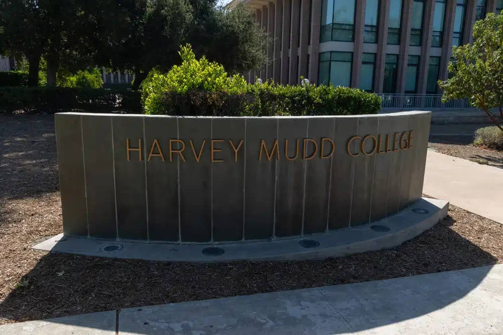 Entrance sign to Harvey Mudd College bearing the college's name.