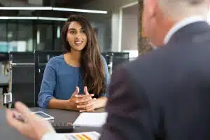 Female student talking to a male interviewer.