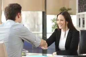 Shaking hands during an interview.