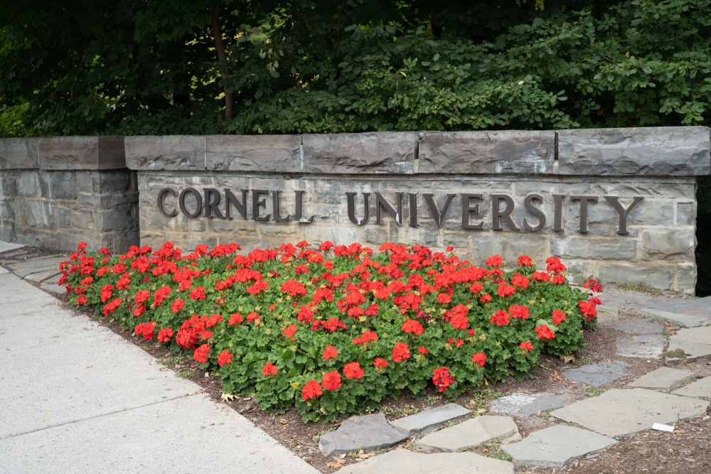 Signage of Cornell University near the entrance.