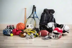 Sports equipments placed on the floor.