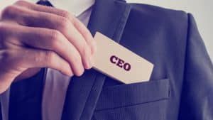 Unidentified person putting on a CEO name tag.