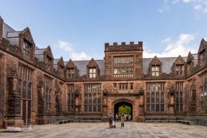 View of students walking in front of the Princeton building.