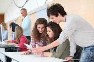 Group of students signing up for internship.