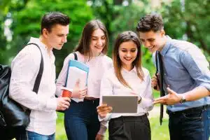 Group of students talking to each other.