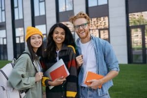 Group of students smiling at the camera.