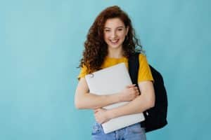 Young woman smiling at the camera.