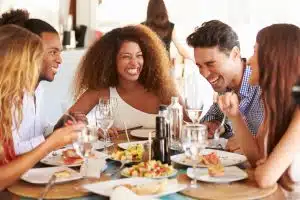 a group of students eating on a table