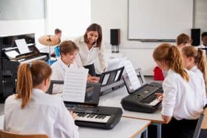 a group of boarding school student having a music class