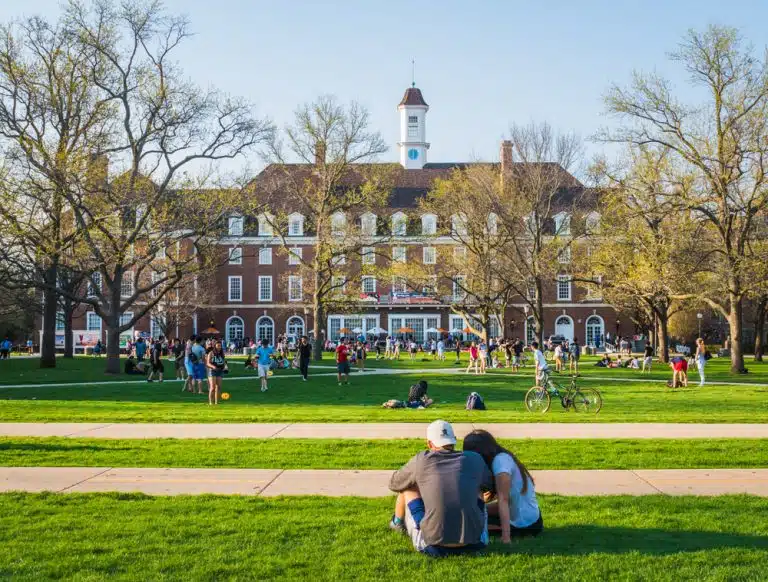 Students lounging around the building in Urbana-Champaign.