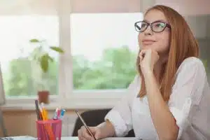 a female student thinking how to colleges