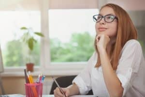 a female student appears to be thinking intently