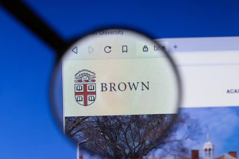 Brown University logo flashed unto a screen and magnified