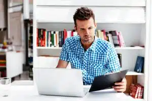 Male man attending an online class