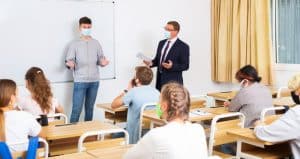 a student reporting in the front of the class