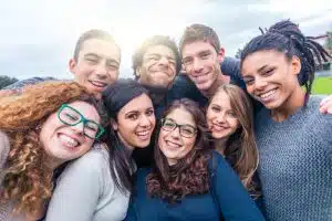 View of people smiling at the camera.