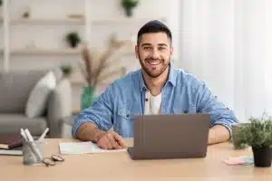 View of a Jewish man working on a desk.