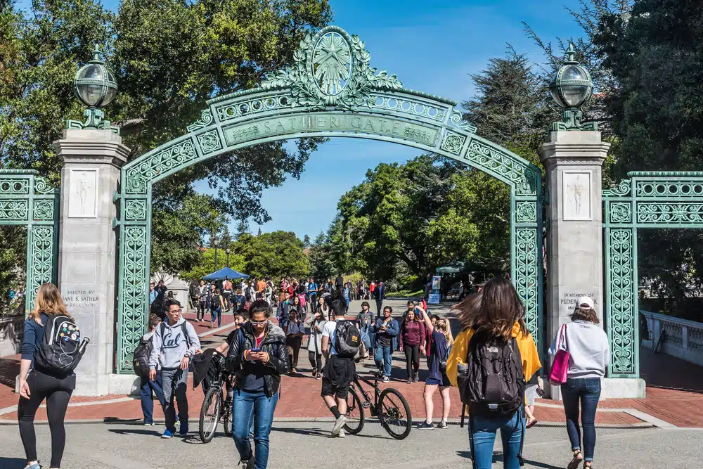 Berkeley University arc with students passing through it