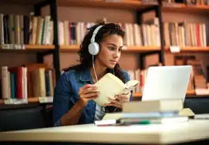 a female student studying inside a library