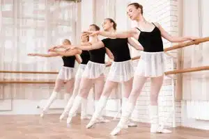 female ballet dancers rehearsing inside a dance studio