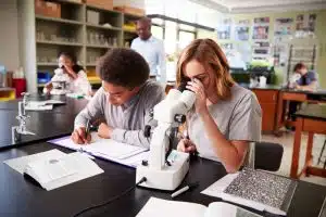 two biology students in a science class