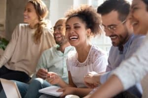 Group of students laughing together.