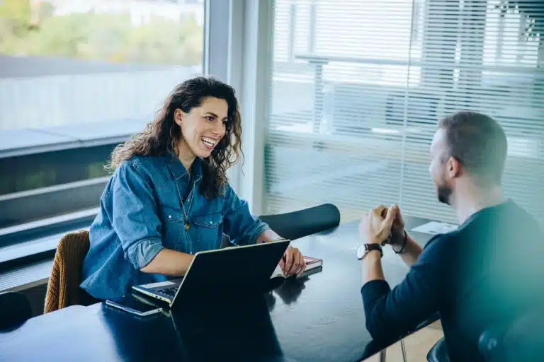 a female student being interview by johns hopkins admission officer