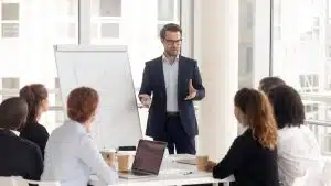 a group of young professionals in a meeting room