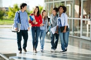 a group of college students looking happy