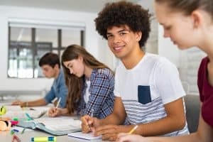 Group of students studying next to each other.