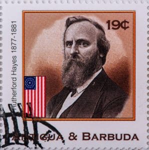 Rutherford B. Hayes' face on a postal stamp