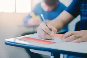 A student taking an exam.