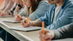 Students taking an exam.