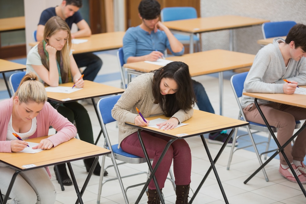 Group of students taking entrance exams