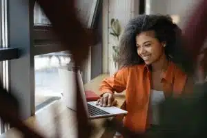 View of a female student working in front of her computer.