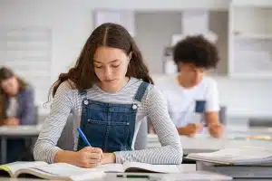 A student studying in a table.