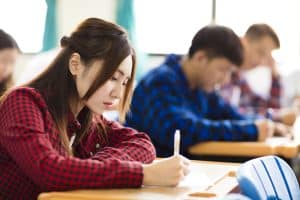 Students taking an exam.