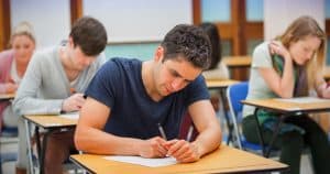 students in a public school taking an exam.