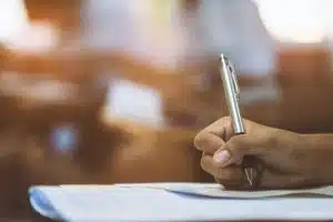 Close up of a student taking an exam.